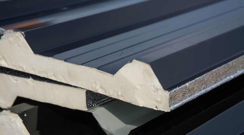 Close-up of layered insulation panels with fasteners.